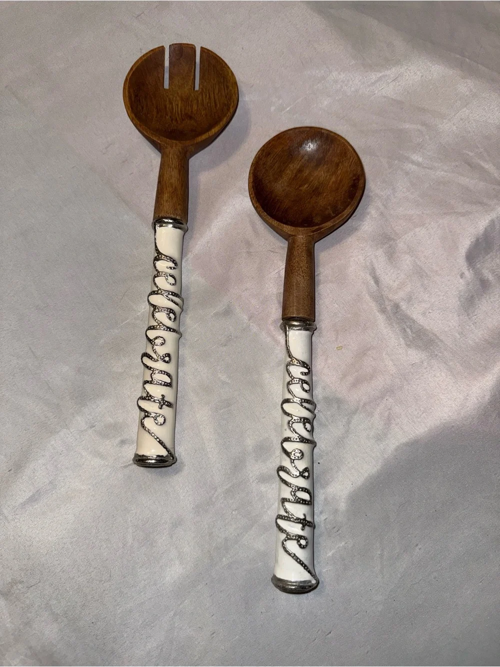 Wooden Salad Servers with Decorative White Handles and the word CELEBRATE.